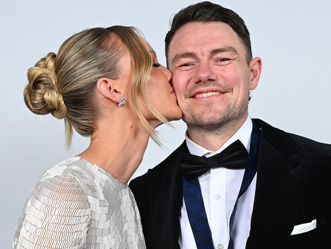 BRISBANE, AUSTRALIA - SEPTEMBER 25: Lachie Neale of the Lions and wife Julie pose for portraits after Lachie Neale was awarded the Brownlow Medal during the 2023 Brownlow Medal at The Gabba on September 25, 2023 in Brisbane, Australia. (Photo by Albert Perez/AFL Photos via Getty Images)