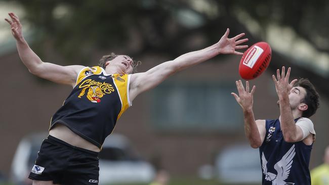 Key man Josh Butland stretches for a mark for Frankston YCW. Picture: Valeriu Campan.