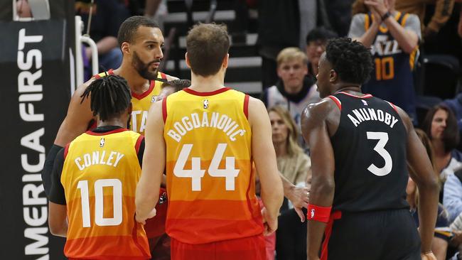 Utah Jazz centre Rudy Gobert, rear, is separated from Toronto Raptors forward OG Anunoby in the second half of an NBA game in Salt Lake City earlier this week. Picture: AP