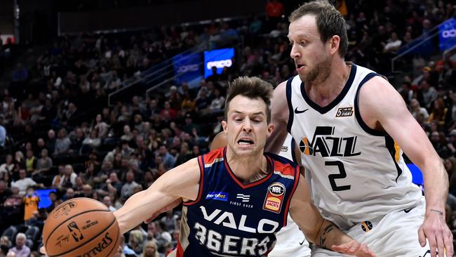 36ers star Nathan Sobey drives around former Adelaide lad and Utah Jazz superstar Joe Ingles during the historic NBL v NBA clash at Vivint Smart Home Arena in Salt Lake City. Picture: Gene Sweeney Jr./Getty Images/AFP