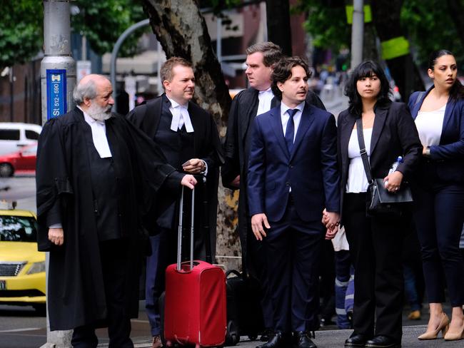 Killer driver Christopher Joannidis arriving at court with his legal team. Picture: Luis Enrique Ascui