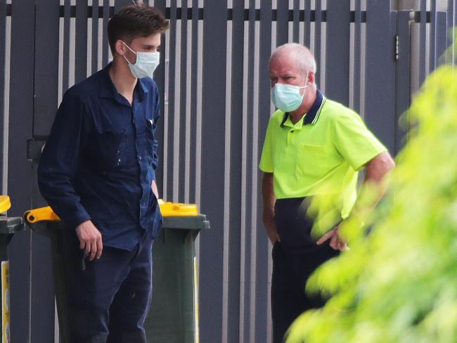 Workers onsite at TriCare Mermaid Beach Tuesday morning after it was revealed a worker (not pictured) at the site may have been exposed to COVID-19. Picture: Glenn Hampson