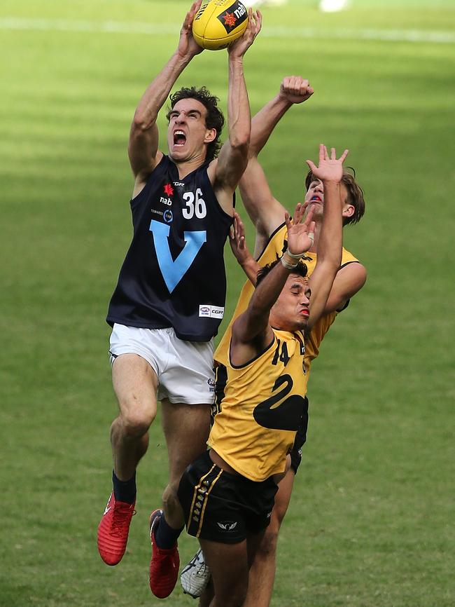 Ben King flies for a mark while playing for Vic Metro against Western Australia in the Under 18 championships. Picture: Getty