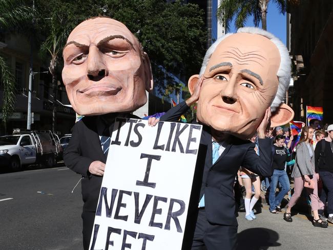 Voters can tell Tony Abbott and Malcolm Turnbull apart, even if protestors supporting same-sex marriage in Brisbane on Saturday could not. Pictures: Jack Tran