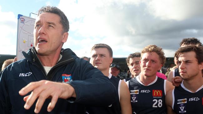 Ballarat coach Anthony Koutoufides talks to the team at one of the breaks. Picture Yuri Kouzmin