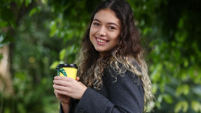 The mercury has dropped in Cairns. Mecedes Aras of Edge Hill enjoys early morning walks and a coffee in the Cairns Botanic Gardens. PICTURE: BRENDAN RADKE