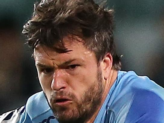 SYDNEY, AUSTRALIA - MAY 03: Adam Ashley-Cooper of the Waratahs is tackled by Beauden Barrett of the Hurricanes during the round 12 Super Rugby match between the Waratahs and the Hurricanes at Allianz Stadium on May 3, 2014 in Sydney, Australia. (Photo by Mark Metcalfe/Getty Images)