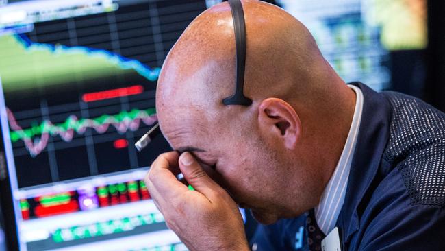 There were extraordinary scenes in the New York Stock Exchange where 1000 points were wiped within minutes of opening. Picture: Andrew Burton/Getty Images.