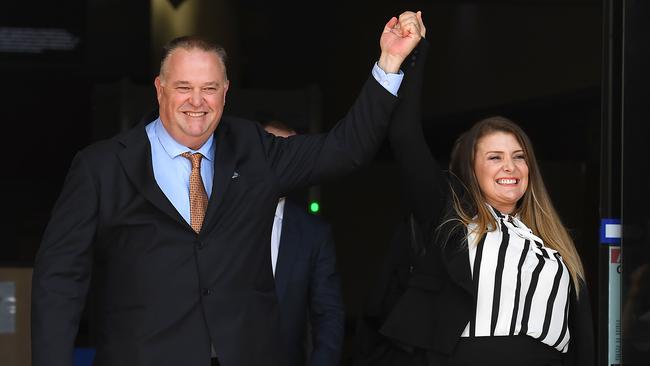 Former Queensland Police officer Rick Flori (left) and social justice advocate Renee Eaves react as they emerge from the Southport Magistrates Court. Picture: AAP