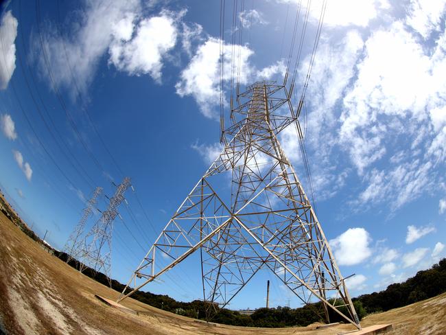 Power lines at the AGL Power Station at Torrens Island in Adelaide, Monday, November 4, 2019.  (AAP Image/Kelly Barnes) NO ARCHIVING