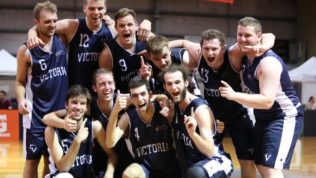 Victoria celebrates its win in the men’s Ivor Burge championships.   Picture: Basketball Victoria)