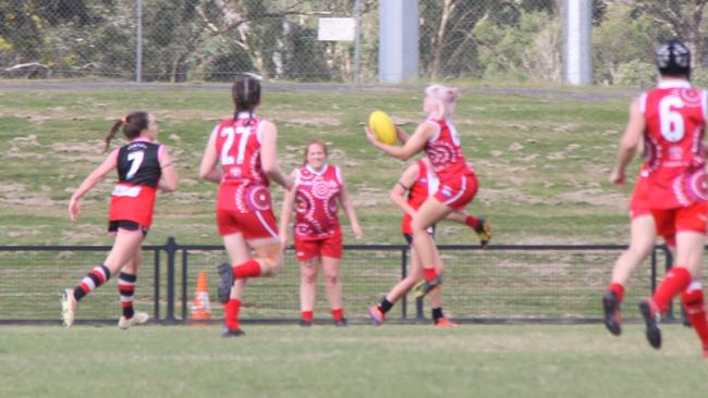 Spectacular mark: Lilli Hutchings was a force of nature taking this mark in her 51st game for the Lismore Swans women's team against the Sawtell Saints on May 29, during the 2021 Sir Doug Nicholls Round, at Oakes Ovals, Lismore. Picture: Alison Paterson