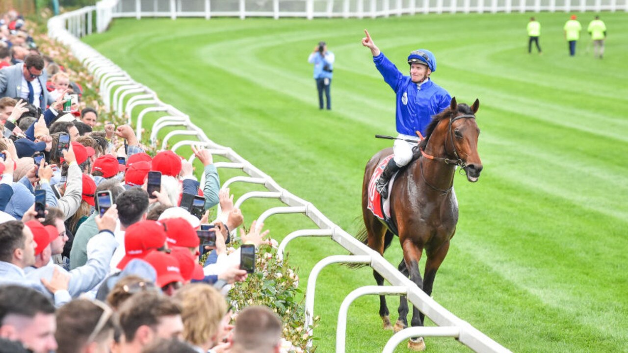 James McDonald salutes The Valley crowd after winning the Cox Plate with Anamoe. Picture: Reg Ryan-Racing Photos via Getty Images