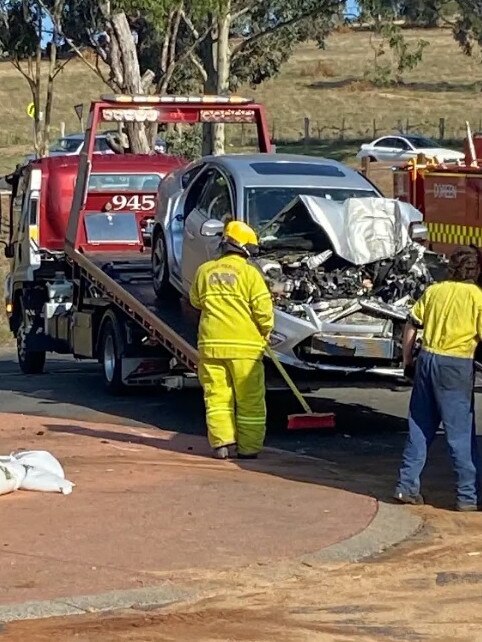 A wrecked vehicle is towed after an elderly woman was involved in an accident. Picture: Supplied