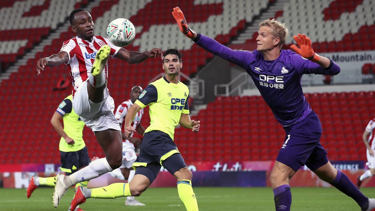 Stoke City's Saido Berahino, left, in action against Huddersfield Town.