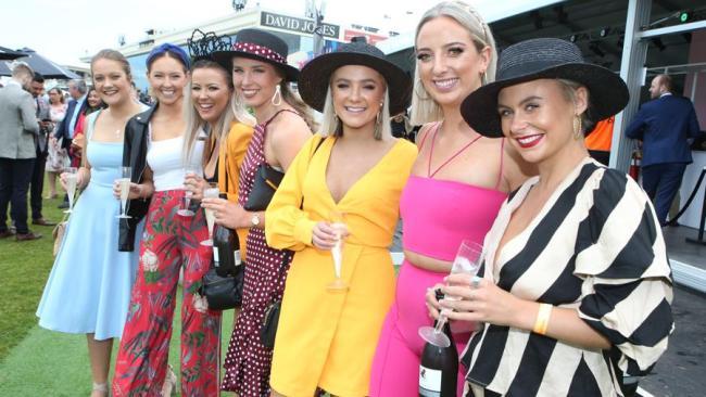 Racegoers enjoy themselves on Caulfield Cup Day.