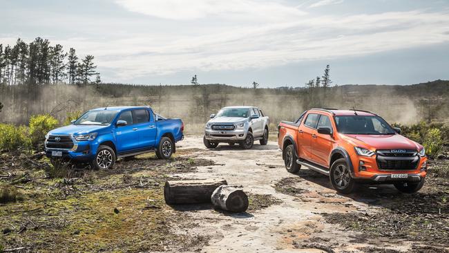 The new Isuzu D-Max (right) arrives to take on the Toyota HiLux and Ford Ranger. Photos: by Thomas Wielecki