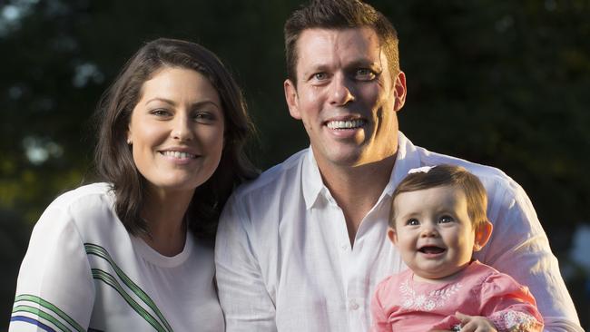 SAWEEKEND EMBARGO APPLIES. Adelaide Crows CEO Andrew Fagan and partner Alana Smith withtheir baby girl, Giselle (7 months). Picture by Matt Turner.