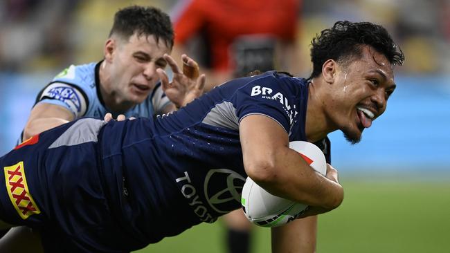 TOWNSVILLE, AUSTRALIA - JULY 27: Jeremiah Nanai of the Cowboys scores a try during the round 21 NRL match between North Queensland Cowboys and Cronulla Sharks at Qld Country Bank Stadium, on July 27, 2024, in Townsville, Australia. (Photo by Ian Hitchcock/Getty Images)