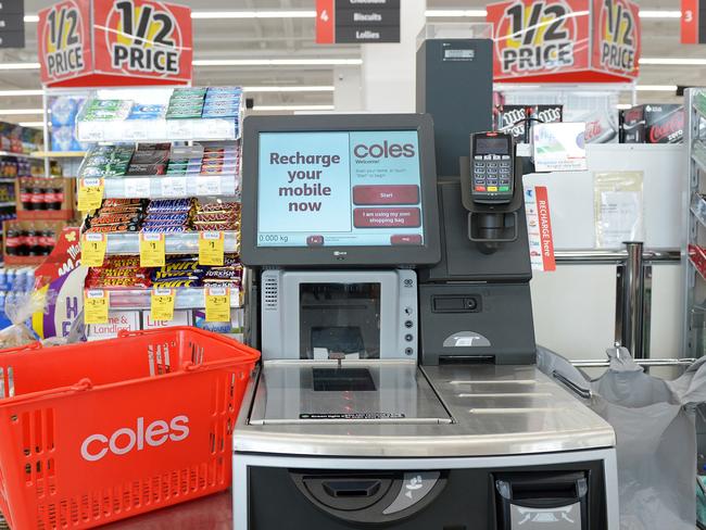 A shopping basket is arranged for a photograph next to a self checkout counter in a Coles supermarket, operated by Wesfarmers Ltd., in Melbourne, Australia, on Tuesday, Feb. 23, 2016. Wesfarmers, Australia's largest retailer, is scheduled to report interim results on Feb. 24. Photographer: Carla Gottgens/Bloomberg via Getty Images