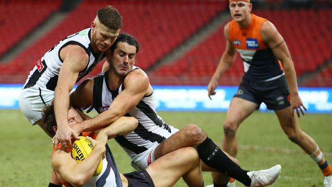 Too high? Should this have been a free kick to Toby Greene? Picture: AAP Images