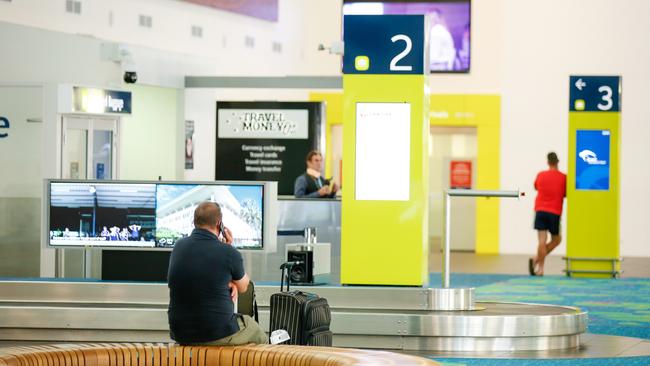 Darwin International Airport looking deserted following a huge drop in arrivals due to the coronavirus pandemic. Picture: Glenn Campbell