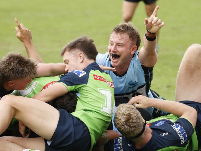 SUNDAY TELEGRAPH. MARCH 26, 2022.ÃPictured is Sharks player Benjamin Lavender claiming his teammate Talanoa Penitani's try during the Cronulla Sharks v Canberra Raiders for the SG Ball, NSWRL junior reps game at PointsBet Stadium in Cronulla today. Picture: Tim Hunter.