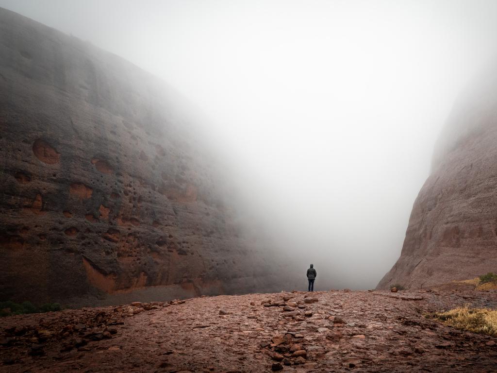 A misty pic taken at Uluru-Kata Tjuta National Park, Northern Territory. It placed third in People Nature. Picture: Steven Genesin/TNC Oceania Photo Contest