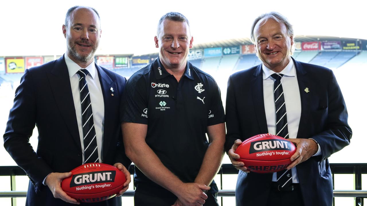 Carlton president Luke Sayers (left), coach Michael Voss and chief executive Brian Cook.