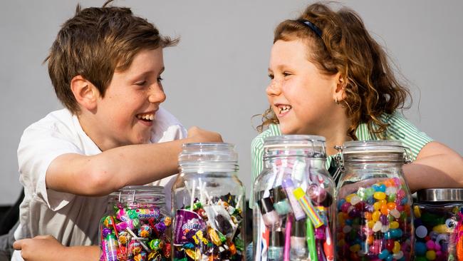 Byron Jordan, 11, and Amelie Saunders, 6, are still urging people to come along to the Mimosa Public School’s annual fundraising carnival on Saturday. Picture: Julian Andrews