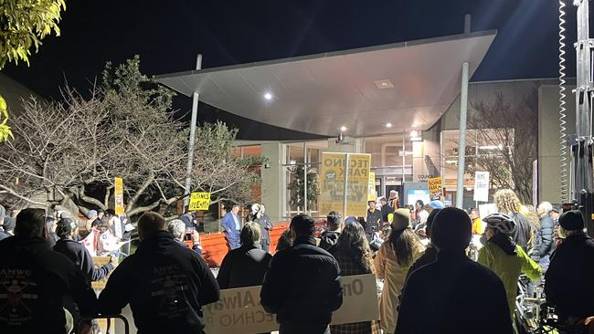 Protesters outside the council chambers made speeches and shouted chants including ‘once a home, always a home, save techno park’. Picture: Nilsson Jones