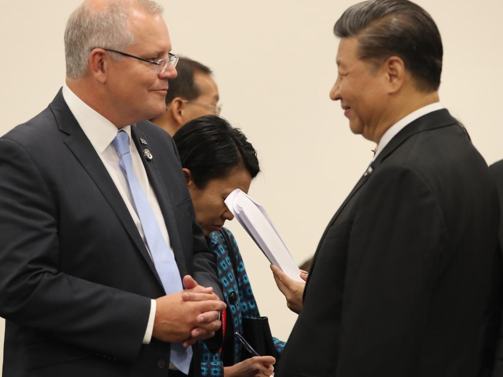 Australian Prime Minister Scott Morrison speaking with Xi Jinping in Japan in 2019. Picture: Adam Taylor.