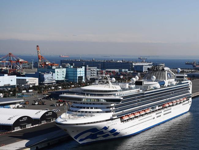 The Diamond Princess cruise ship, with around 3,600 people quarantined onboard due to fears of the new coronavirus, is seen anchored at the Daikoku Pier Cruise Terminal in Yokohama port on February 10, 2020. - Six more people on a cruise ship off Japan are found to have the new coronavirus, the government said February 9, bringing the number who have tested positive on board to 70. (Photo by CHARLY TRIBALLEAU / AFP)