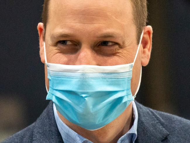 Britain's Prince William, Duke of Cambridge wears a face mask because of the pandemic as he visits a coronavirus vaccination centre at Kingâs Lynn Corn Exchange in King's Lynn, eastern England, on February 22, 2021. - Prince William spoke to NHS staff and volunteers about their experiences of being involved in the largest vaccination programme in British history. The Duke also met and spoke with a number of people receiving their vaccine that day. (Photo by Arthur Edwards / various sources / AFP)