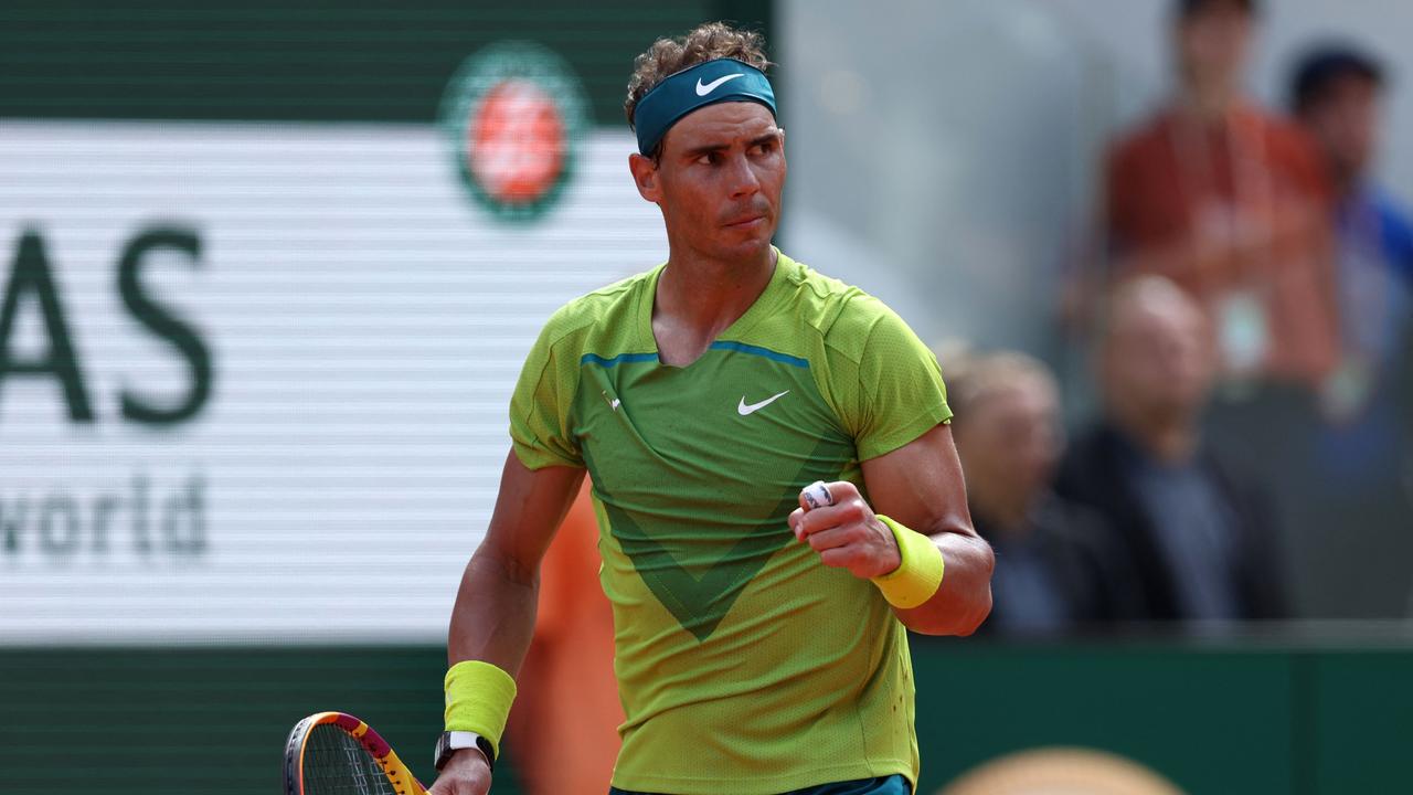 Spain's Rafael Nadal reacts after a point against Norway's Casper Ruud during their men's singles final match on day fifteen of the Roland-Garros Open tennis tournament at the Court Philippe-Chatrier in Paris on June 5, 2022. (Photo by Thomas SAMSON / AFP)