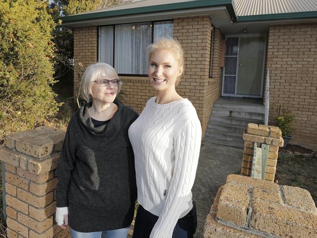 Lila Landowski with her mother Krystyna Landowski at the public housing home where she grew up and where her mother has lived for more than 30 years. Picture: PATRICK GEE