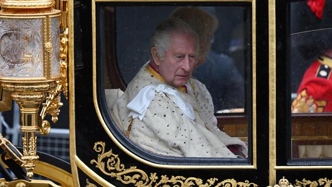 Britain's King Charles III and Camilla, Queen Consort, ride in the Diamond Jubilee State Coach on the way to his coronation. Picture: AFP