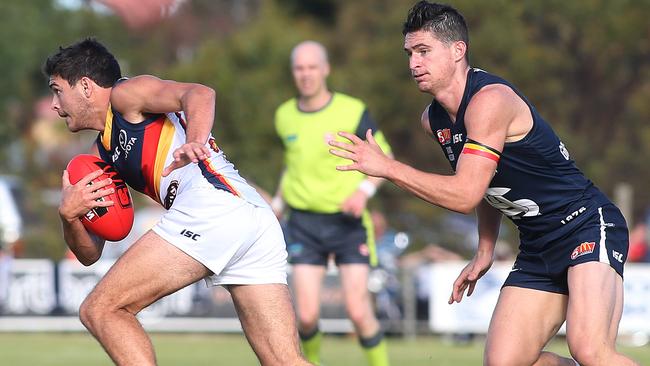 Adelaide Crows’ Ben Jarman escapes during the Crows’ win  (Adelaide) with the ball during the third quarter. South Adelaide v Adelaide, at Encounter Bay Oval. SANFL Football. 16/04/17 Picture: Stephen Laffer