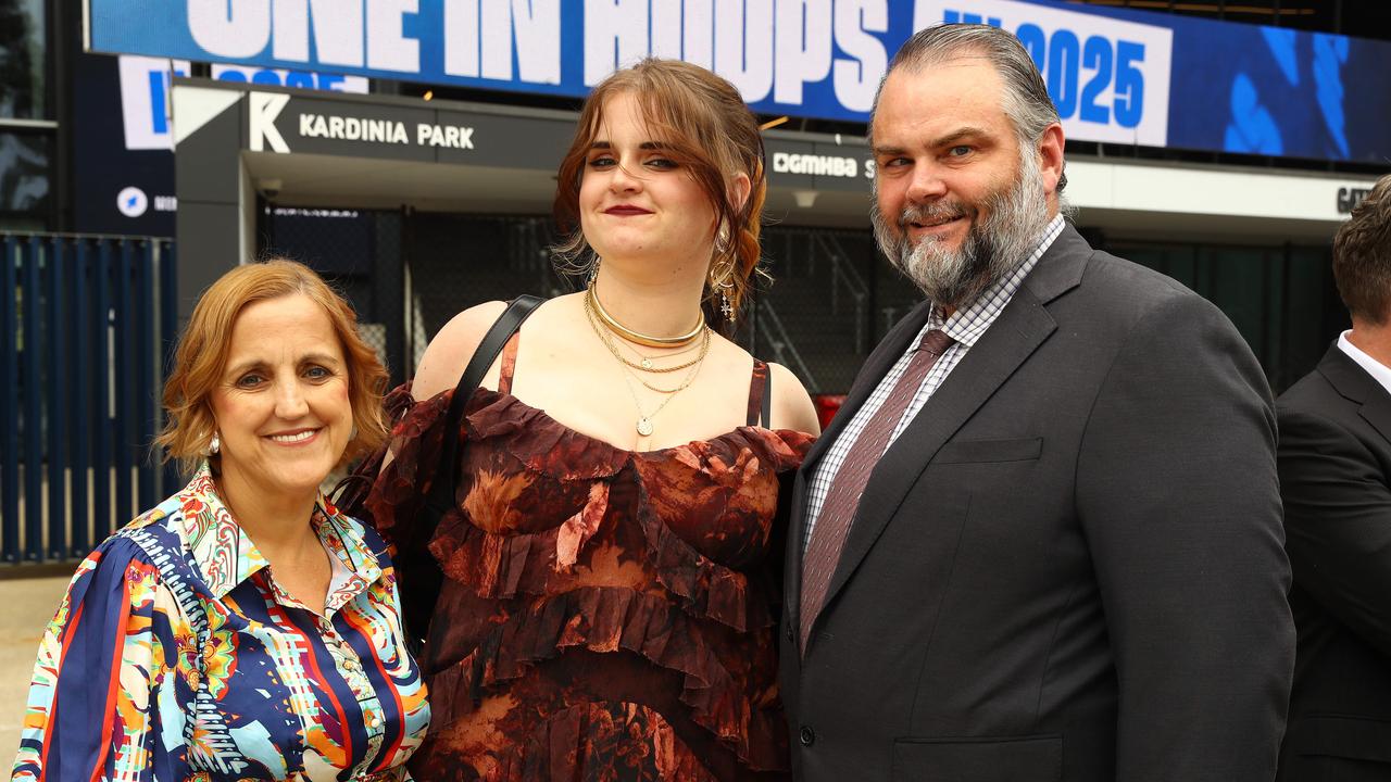 Sophie Alexander with parents Lesley and Mick at the Belmont High School year 12 graduation at GMHBA Stadium. Picture: Alison Wynd