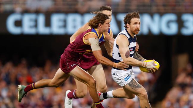 Zach Tuohy of the Cats and Jarrod Berry of the Lions in action during the 2020 AFL Second Preliminary Final match between the Brisbane Lions and the Geelong Cats at The Gabba. Picture: Getty Images