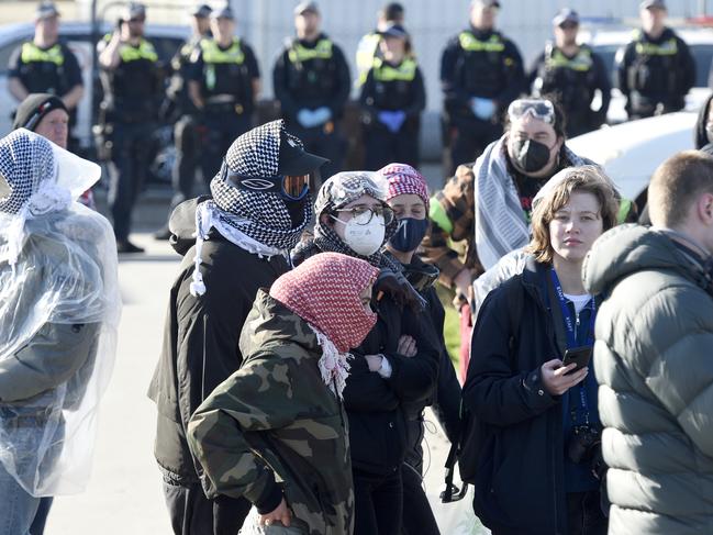 Protesters picket outside the factory. Picture: Andrew Henshaw