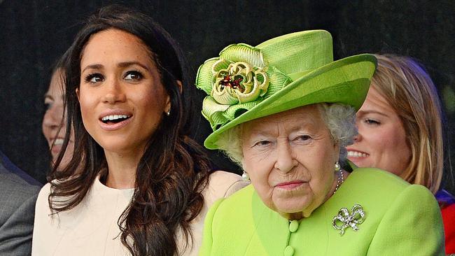 Queen Elizabeth II and Meghan, Duchess of Sussex, attend the opening of the Mersey Gateway Bridge, in 2018.