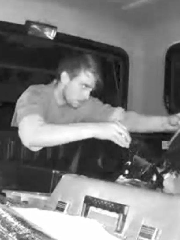 A man is caught rifling through a man's ute in Kew. Picture: Victoria Police.