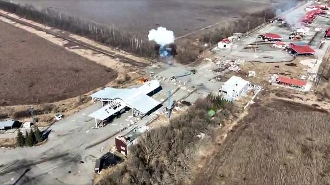 Smoke rising from a destroyed military vehicle after the rebel raid in Russia’s Belgorod region on Tuesday. Picture: Russian Defence Ministry via AFP