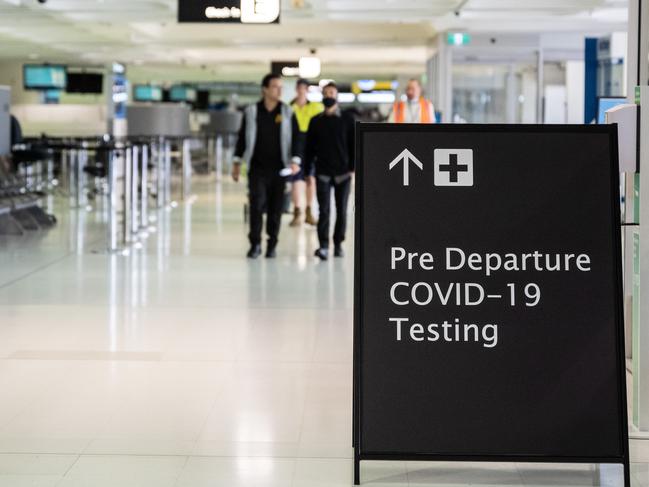 A sign for pre-departure Covid-19 testing at Sydney Airport. Picture: NCA NewsWire / James Gourley