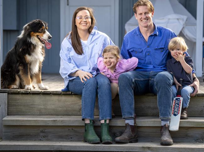 Tom Jonas and his wife Millie and their children Matilda, 3, and George, 2, and their Australian Shepherd "Howard" at Millie's parents’ property at Middleton. Picture: Mark Brake