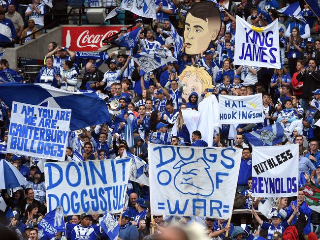 Bulldogs fans celebrate during their Round 5 NRL match between the Canterbury Bankstown Bulldogs and the South Sydney Rabbitohs at ANZ Stadium in Sydney on Friday, April 3, 2015. (AAP Image/Mick Tsikas) NO ARCHIVING, EDITORIAL USE ONLY