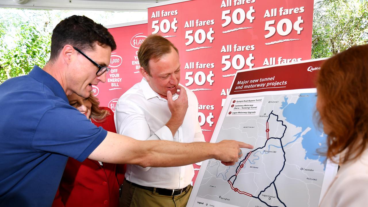 Transport Minister Bart Mellish, left, and Premier Steven Miles, centre, in Mount Ommaney on Sunday to announce the possibility of a new tunnel. Picture: John Gass