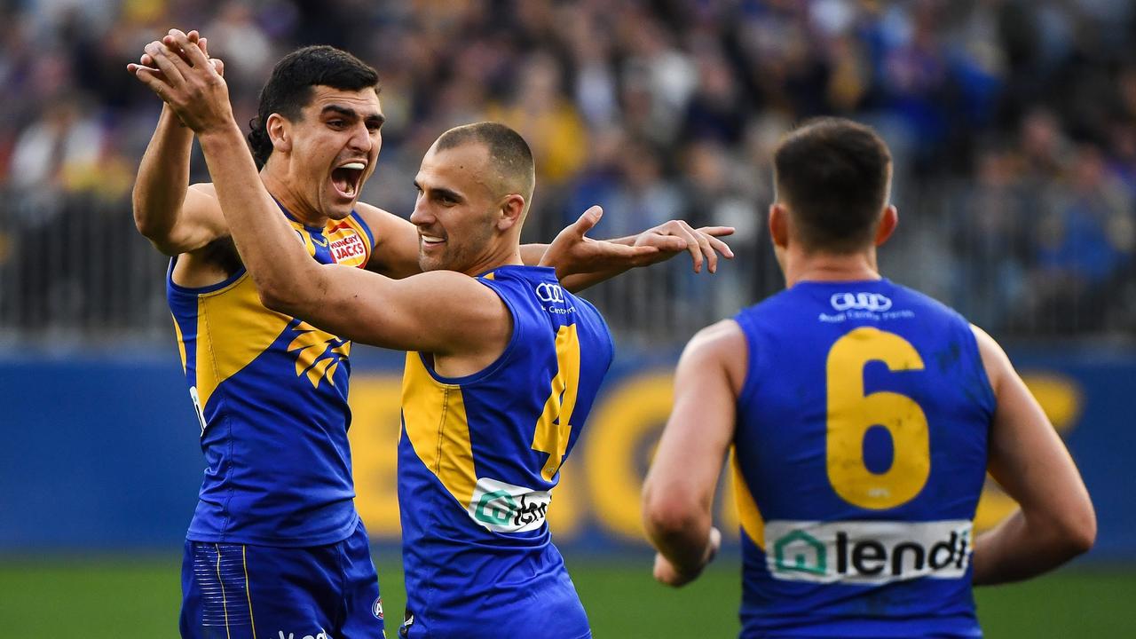 Dom Sheed celebrates a late goal with teammate Tom Cole. Picture: Daniel Carson/AFL Photos