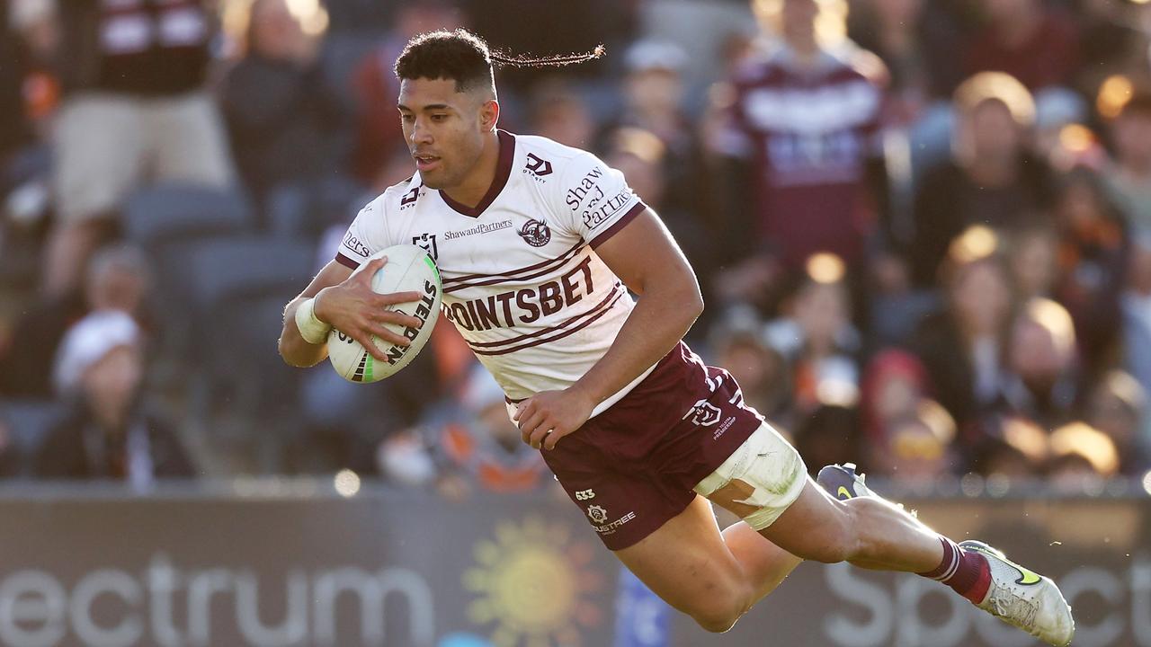 SYDNEY, AUSTRALIA - JUNE 12: Tolutau Koula of the Sea Eagles scores a try during the round 14 NRL match between the Wests Tigers and the Manly Sea Eagles at Campbelltown Stadium, on June 12, 2022, in Sydney, Australia. (Photo by Matt King/Getty Images)